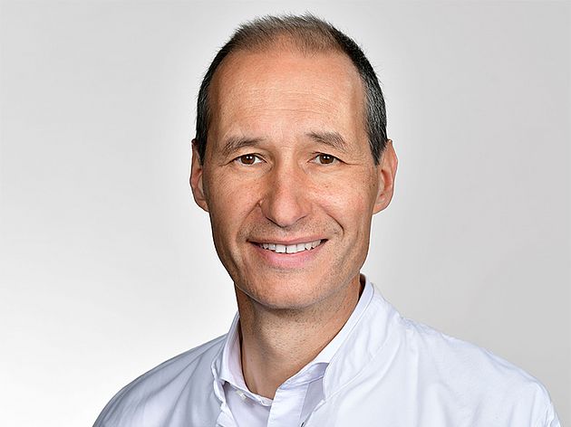 Portrait von Dr. Milizer