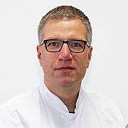 Profilbild von Dr. med. Sebastian Schenk, MHBA